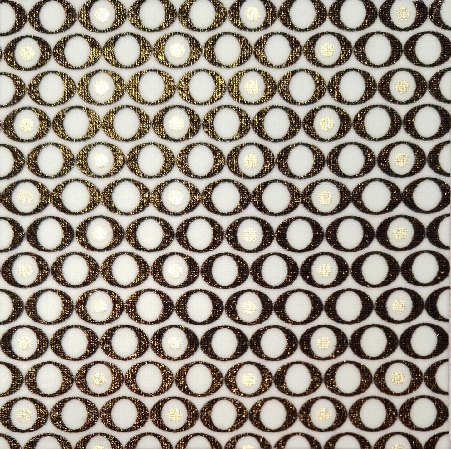 Close-up of fabric pattern of interlocking rings on a textured surface (Colour: P26)