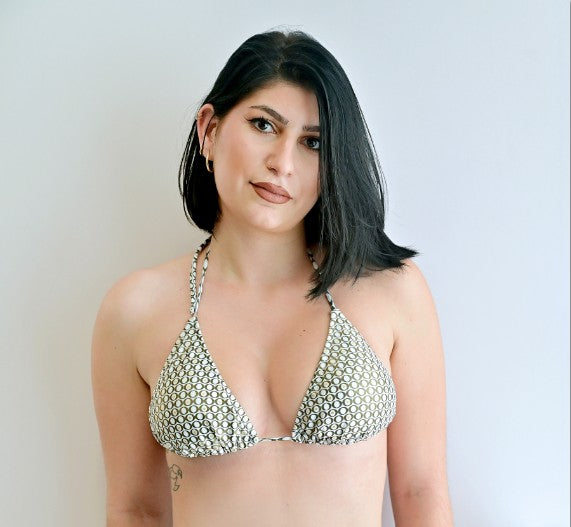 Sunlover Swimwear model wearing a white black and gold classic triangle bikini top (Colour: P26)