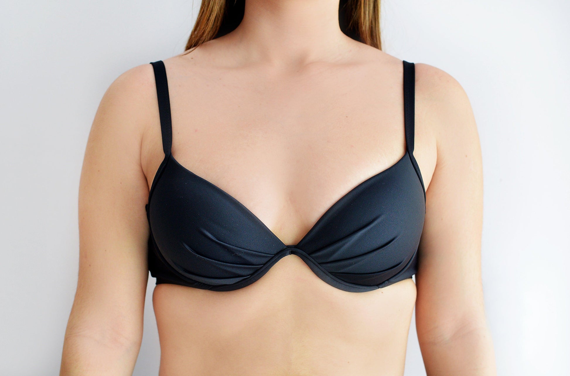 Sunlover Swimwear model wearing a black bikini top (Colour: BLK)