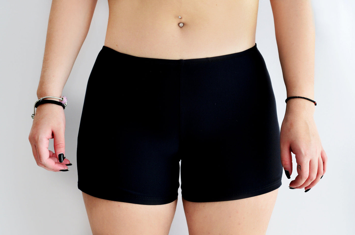 Sunlover swimwear model wearing black shorts on a plain background (Colour: BLK)