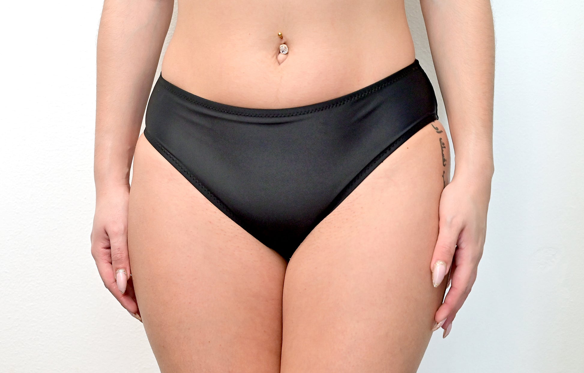 Sunlover Swimwear model wearing black full cover bikini 