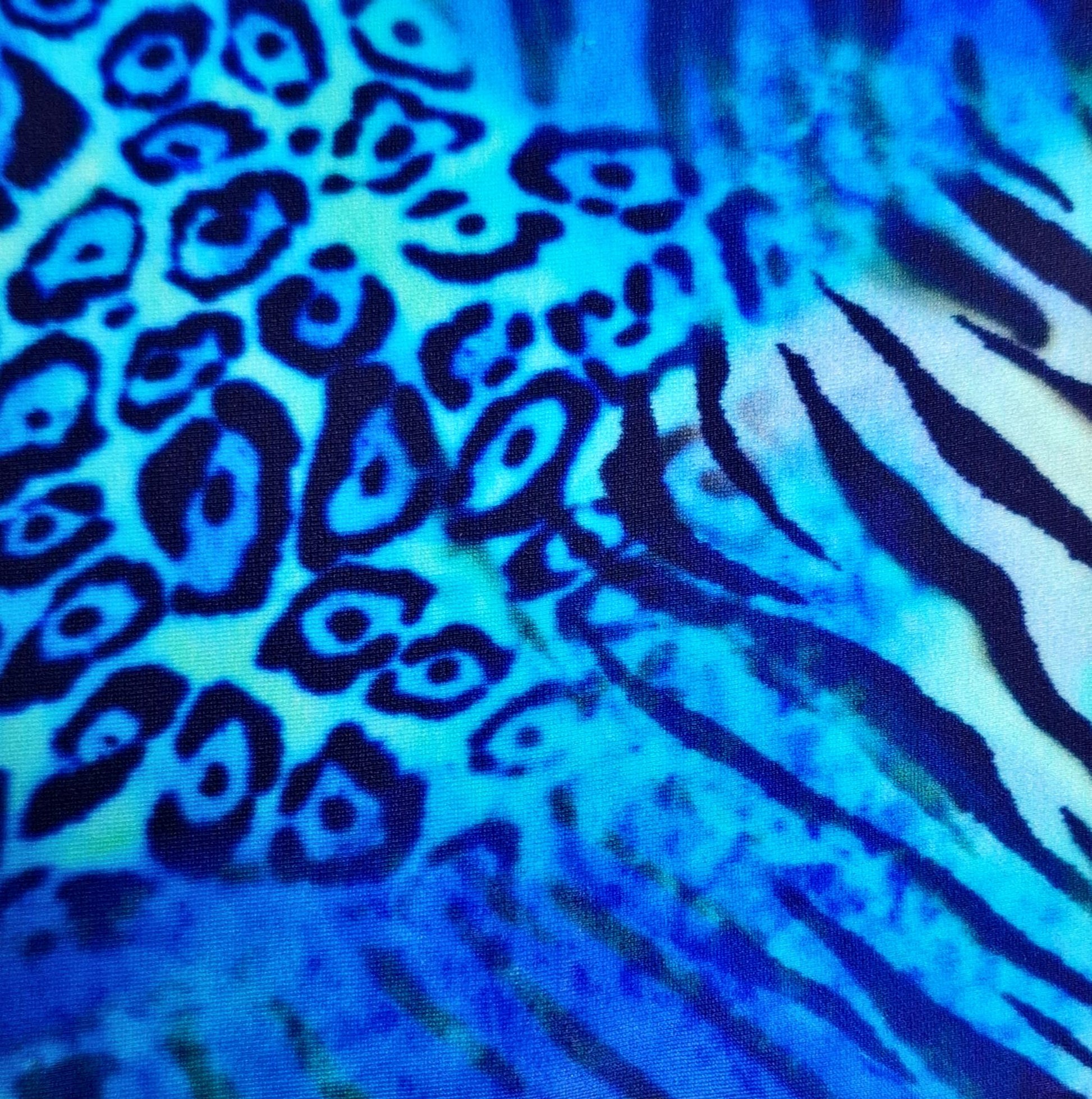 Close-up of fabric blue tiger print (Colour: P19)